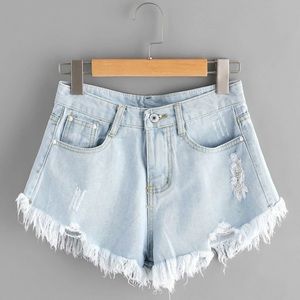 SHEIN Raw Hem Ripped Denim Shorts